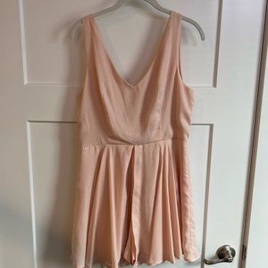 Light pink romper with skirt over lay